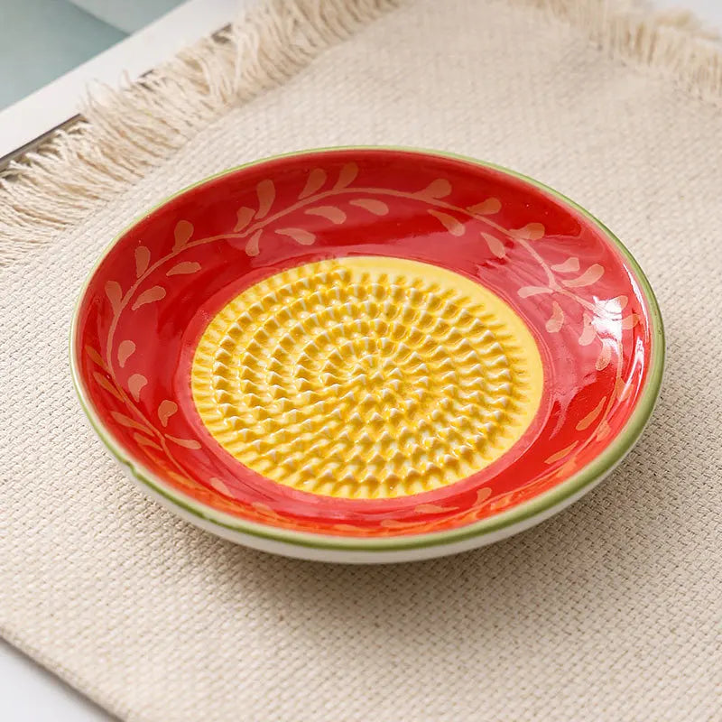 Grattugia di ceramica per frutta e verdura, fresca e congelata.