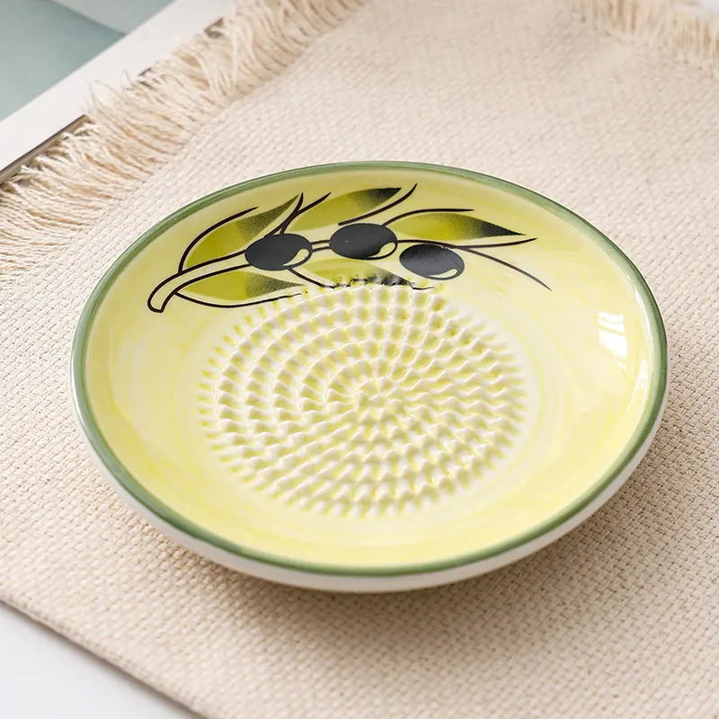 Grattugia di ceramica per frutta e verdura, fresca e congelata.